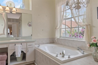 Stunning Custom-Built Palmwood Courtyard Home Nestled In The on Silverthorn Country Club in Florida - for sale on GolfHomes.com, golf home, golf lot