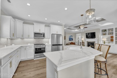 Discover low-maintenance living in this Collington Towns duplex on Cape Fear National At Brunswick Forest in North Carolina - for sale on GolfHomes.com, golf home, golf lot