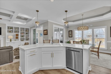 Discover low-maintenance living in this Collington Towns duplex on Cape Fear National At Brunswick Forest in North Carolina - for sale on GolfHomes.com, golf home, golf lot