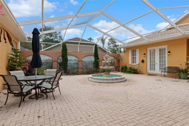Stunning Custom-Built Palmwood Courtyard Home Nestled In The on Silverthorn Country Club in Florida - for sale on GolfHomes.com, golf home, golf lot
