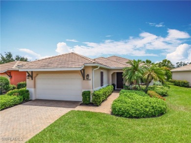 This home has a brand-New Roof! Stunning Panoramic Lake & Golf on Pelican Preserve Golf Club in Florida - for sale on GolfHomes.com, golf home, golf lot