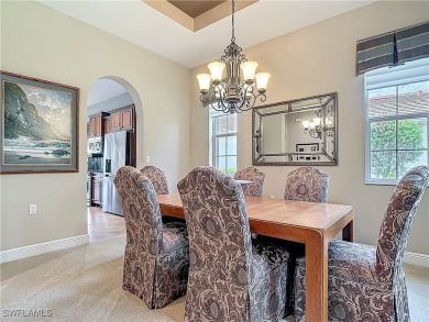 This home has a brand-New Roof! Stunning Panoramic Lake & Golf on Pelican Preserve Golf Club in Florida - for sale on GolfHomes.com, golf home, golf lot