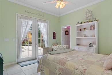 Stunning Custom-Built Palmwood Courtyard Home Nestled In The on Silverthorn Country Club in Florida - for sale on GolfHomes.com, golf home, golf lot