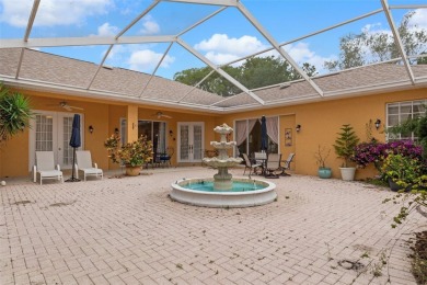 Stunning Custom-Built Palmwood Courtyard Home Nestled In The on Silverthorn Country Club in Florida - for sale on GolfHomes.com, golf home, golf lot