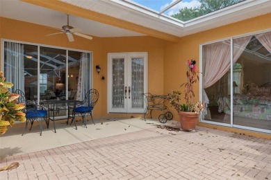 Stunning Custom-Built Palmwood Courtyard Home Nestled In The on Silverthorn Country Club in Florida - for sale on GolfHomes.com, golf home, golf lot