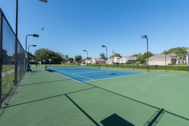 Stunning Custom-Built Palmwood Courtyard Home Nestled In The on Silverthorn Country Club in Florida - for sale on GolfHomes.com, golf home, golf lot