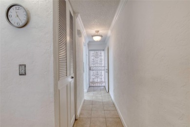 Enjoy easy living in this beautifully furnished 2-bedroom on Daytona Beach Golf Club in Florida - for sale on GolfHomes.com, golf home, golf lot