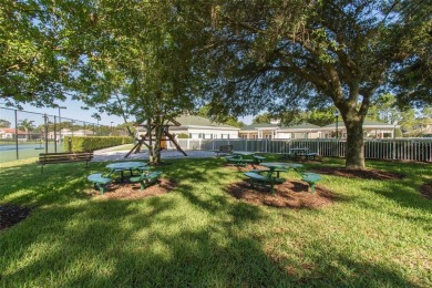 Stunning Custom-Built Palmwood Courtyard Home Nestled In The on Silverthorn Country Club in Florida - for sale on GolfHomes.com, golf home, golf lot