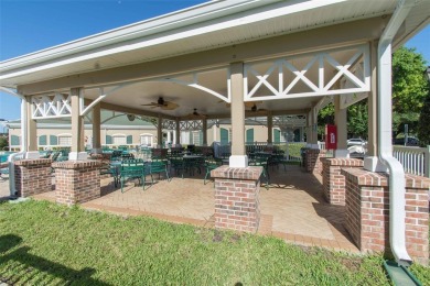 Stunning Custom-Built Palmwood Courtyard Home Nestled In The on Silverthorn Country Club in Florida - for sale on GolfHomes.com, golf home, golf lot