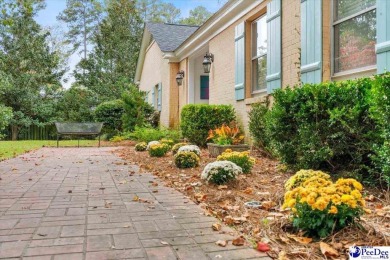 FLORENCE COUNTRY CLUB *The Secret Garden*   A charming cottage on Florence Country Club in South Carolina - for sale on GolfHomes.com, golf home, golf lot