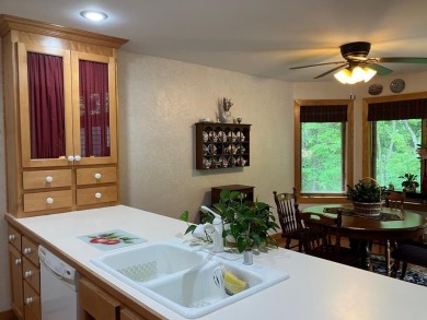 Condo living at its best with easy access to all that Door on Cherry Hills Golf Course in Wisconsin - for sale on GolfHomes.com, golf home, golf lot