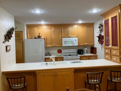 Condo living at its best with easy access to all that Door on Cherry Hills Golf Course in Wisconsin - for sale on GolfHomes.com, golf home, golf lot