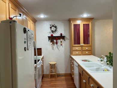 Condo living at its best with easy access to all that Door on Cherry Hills Golf Course in Wisconsin - for sale on GolfHomes.com, golf home, golf lot