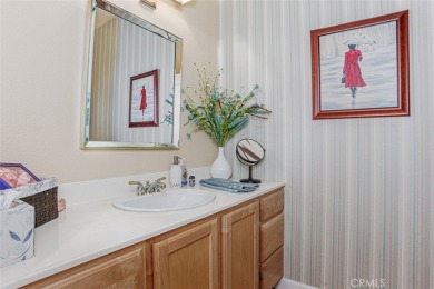 Located in the sought-after 55+ SUN LAKES COUNTRY CLUB, a gated on Sun Lakes Country Club in California - for sale on GolfHomes.com, golf home, golf lot