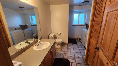 Beautifully built spacious and Log Cabin right on the Sweetwater on Bear Lake Golf Course in Utah - for sale on GolfHomes.com, golf home, golf lot