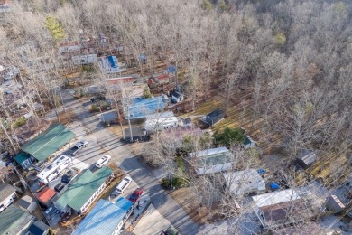 Nestled in the heart of Holiday Out RV Park, this charming on Lake Tansi Village Country Club in Tennessee - for sale on GolfHomes.com, golf home, golf lot