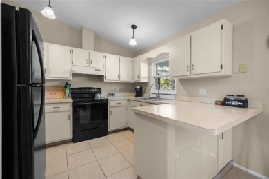 Live the relaxed Florida lifestyle you've been dreaming of in on Oyster Creek Golf Club in Florida - for sale on GolfHomes.com, golf home, golf lot