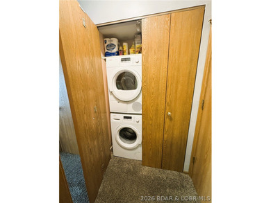 Enjoy effortless lake living in this well-kept, turn-key 1 bed on Sycamore Creek Golf Club in Missouri - for sale on GolfHomes.com, golf home, golf lot