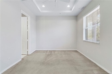 Spacious 3-bedroom, 2 1/2 bath townhouse with a one-car garage on Abacoa Golf Club in Florida - for sale on GolfHomes.com, golf home, golf lot