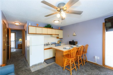 Enjoy effortless lake living in this well-kept, turn-key 1 bed on Sycamore Creek Golf Club in Missouri - for sale on GolfHomes.com, golf home, golf lot