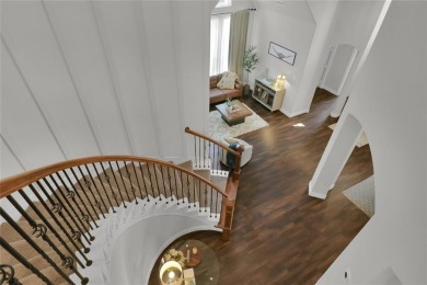Elegant residence located at the first hole of the golf course on The Golf Club at Resort Eagle Mountain Lake in Texas - for sale on GolfHomes.com, golf home, golf lot