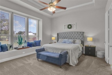 Elegant residence located at the first hole of the golf course on The Golf Club at Resort Eagle Mountain Lake in Texas - for sale on GolfHomes.com, golf home, golf lot