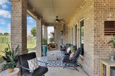 Elegant residence located at the first hole of the golf course on The Golf Club at Resort Eagle Mountain Lake in Texas - for sale on GolfHomes.com, golf home, golf lot