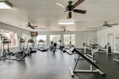 Elegant residence located at the first hole of the golf course on The Golf Club at Resort Eagle Mountain Lake in Texas - for sale on GolfHomes.com, golf home, golf lot