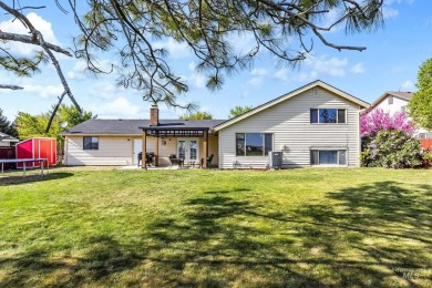 Charming tri-level home in a highly desired subdivision on on Indian Lakes Golf Course in Idaho - for sale on GolfHomes.com, golf home, golf lot