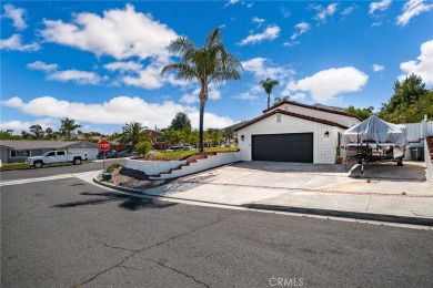 Welcome to 31090 Emperor which sits on an elevated corner lot on Canyon Lake Country Club in California - for sale on GolfHomes.com, golf home, golf lot