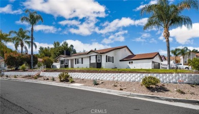 Welcome to 31090 Emperor which sits on an elevated corner lot on Canyon Lake Country Club in California - for sale on GolfHomes.com, golf home, golf lot