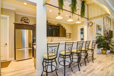 Welcome to this beautifully appointed 3-bedroom, 2.5-bathroom on Binks Forest Golf Club in Florida - for sale on GolfHomes.com, golf home, golf lot