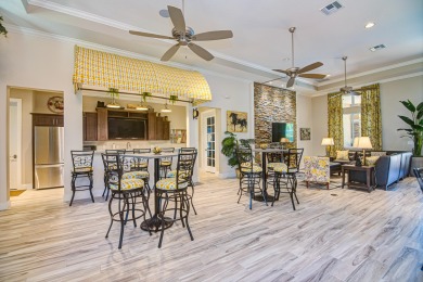 Welcome to this beautifully appointed 3-bedroom, 2.5-bathroom on Binks Forest Golf Club in Florida - for sale on GolfHomes.com, golf home, golf lot