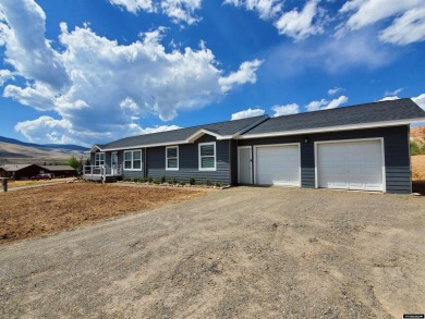 Check out the sweeping views of the golf course and Wind River on Antelope Hills Golf Course in Wyoming - for sale on GolfHomes.com, golf home, golf lot