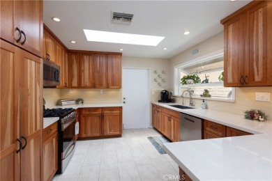 Welcome to a beautifully maintained single-level home nestled on on Mile Square Golf Course in California - for sale on GolfHomes.com, golf home, golf lot
