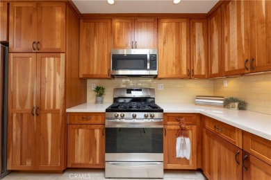 Welcome to a beautifully maintained single-level home nestled on on Mile Square Golf Course in California - for sale on GolfHomes.com, golf home, golf lot