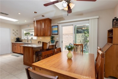 Welcome to a beautifully maintained single-level home nestled on on Mile Square Golf Course in California - for sale on GolfHomes.com, golf home, golf lot