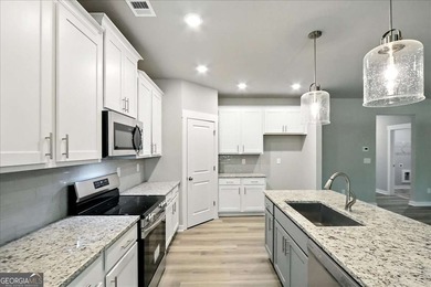 ONLY A FEW HOMES REMAIN IN THE LINKS SECTION OF TRADITOINS OF on Traditions of Braselton Golf Club in Georgia - for sale on GolfHomes.com, golf home, golf lot