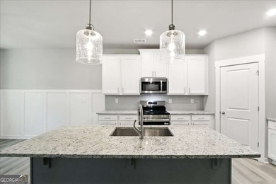 ONLY A FEW HOMES REMAIN IN THE LINKS SECTION OF TRADITOINS OF on Traditions of Braselton Golf Club in Georgia - for sale on GolfHomes.com, golf home, golf lot