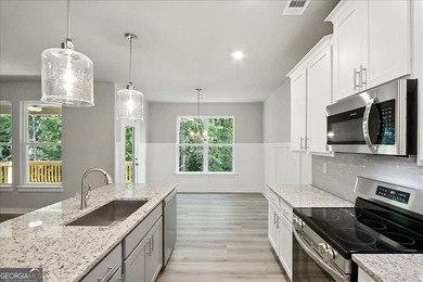 ONLY A FEW HOMES REMAIN IN THE LINKS SECTION OF TRADITOINS OF on Traditions of Braselton Golf Club in Georgia - for sale on GolfHomes.com, golf home, golf lot