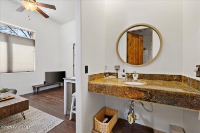 From the moment you enter through the stately iron gate into the on Talking Rock Golf Club in Arizona - for sale on GolfHomes.com, golf home, golf lot
