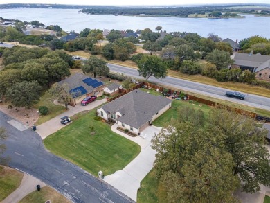 What a great New Years Gift!! Welcome to this elegant like new on Pecan Plantation Country Club in Texas - for sale on GolfHomes.com, golf home, golf lot