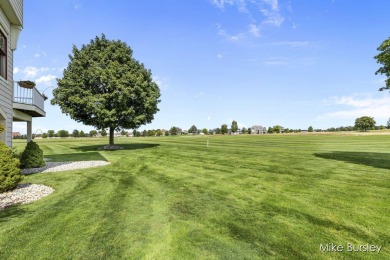 Enjoy the lifestyle and the magnificent views of the 18th on The Macatwa Legends Golf Course in Michigan - for sale on GolfHomes.com, golf home, golf lot