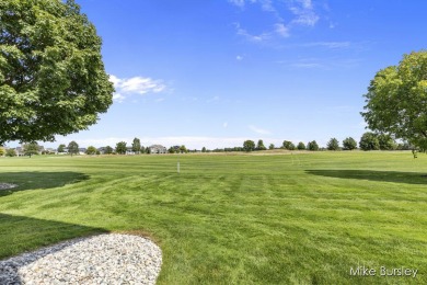 Enjoy the lifestyle and the magnificent views of the 18th on The Macatwa Legends Golf Course in Michigan - for sale on GolfHomes.com, golf home, golf lot