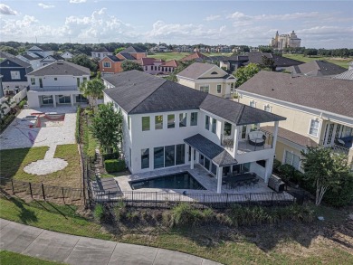 Welcome to 1561 Corolla Ct, a stunning 12-bedroom, 12.5-bathroom on Reunion Resort Golf Course in Florida - for sale on GolfHomes.com, golf home, golf lot