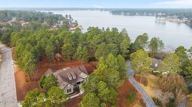Prime location meets stunning lake views! This beautifully on Beacon Ridge Golf and Country Club in North Carolina - for sale on GolfHomes.com, golf home, golf lot