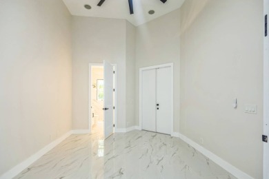Complete modern remodeling. New Roof with 3 solar fans, Full on Heron Bay Golf Club in Florida - for sale on GolfHomes.com, golf home, golf lot
