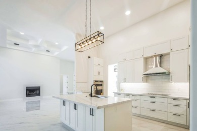 Complete modern remodeling. New Roof with 3 solar fans, Full on Heron Bay Golf Club in Florida - for sale on GolfHomes.com, golf home, golf lot