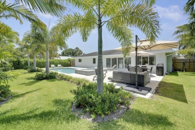 Discover coastal living at its finest in this beautifully on North Palm Beach Country Club in Florida - for sale on GolfHomes.com, golf home, golf lot