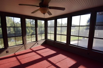 Chalet-style charm meets scenic beauty in this 3-bedroom, 2-bath on River Ridge Golf Club in Iowa - for sale on GolfHomes.com, golf home, golf lot